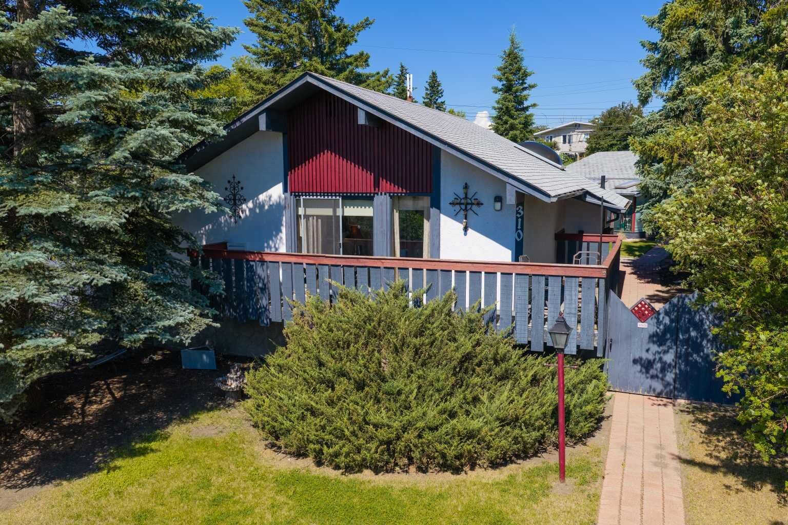 Property Photo: 310 Huntham Place NE AB T2K 4G7