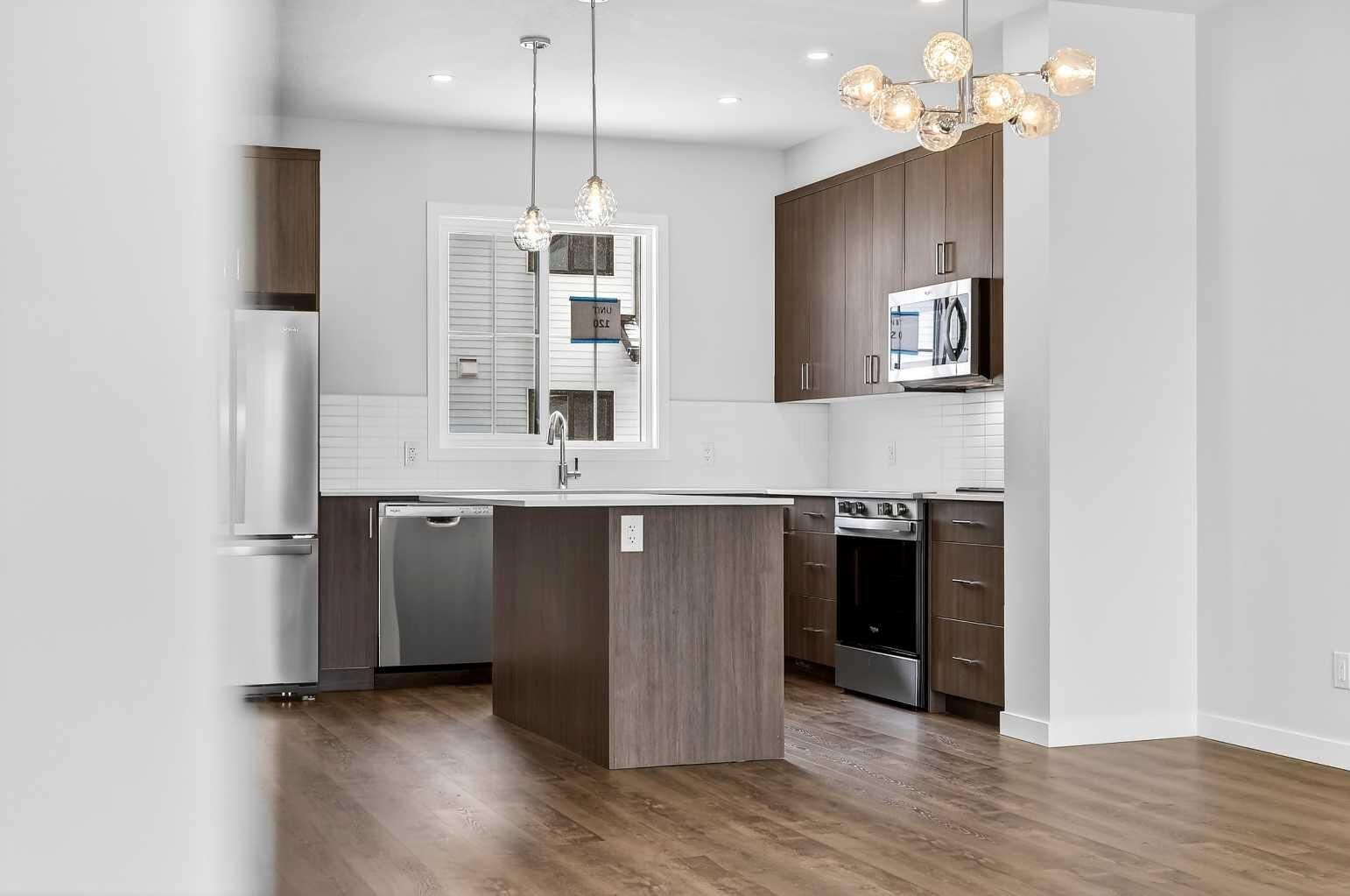 Property Photo: 1750 Rangeview Drive SE 204 AB T3S 0X3