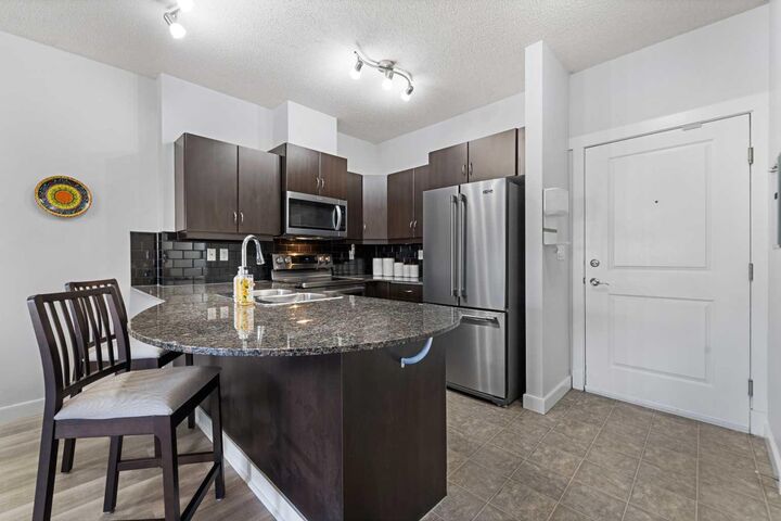 Property Photo:  11811 Lake Fraser Drive SE 3604  AB T2J 7J4 