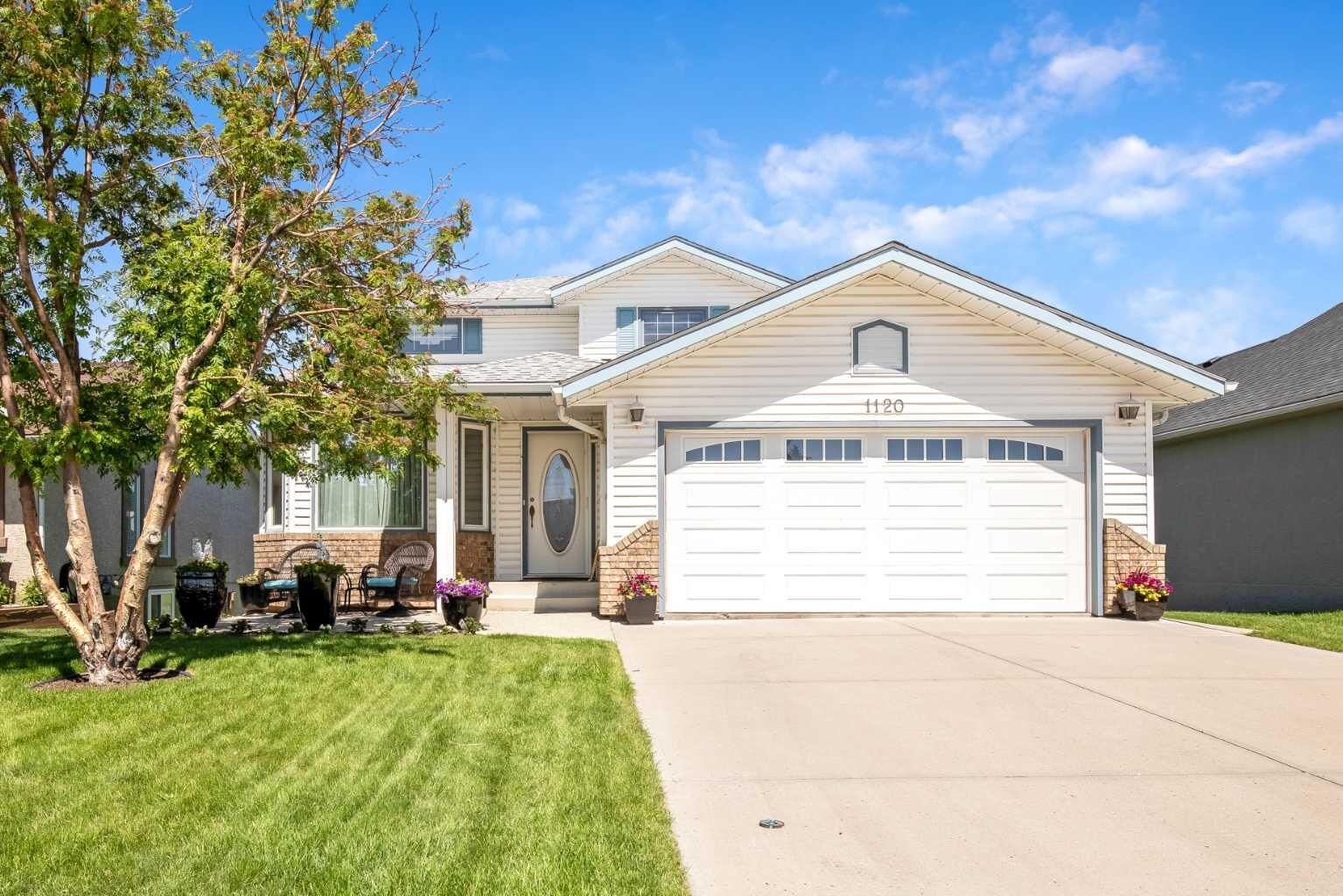 Property Photo: 1120 High Country Drive NW AB T1V 1E2