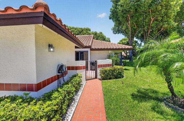 Property Photo:  10546 Beach Palm Court B  FL 33437 