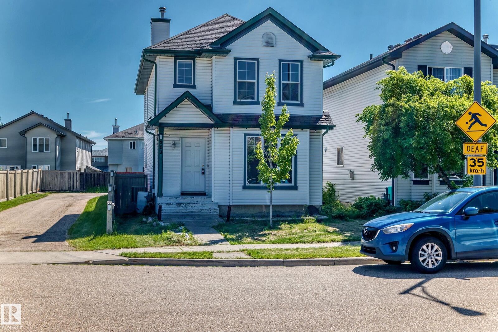 Property Photo:  203 84 Street SW  AB T6X 1H6 