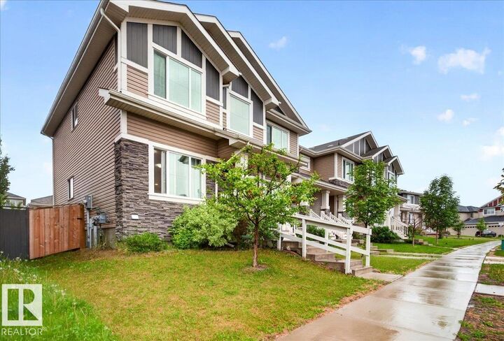 Property Photo:  1187 Cy Becker Road NW  AB T5Y 3V9 