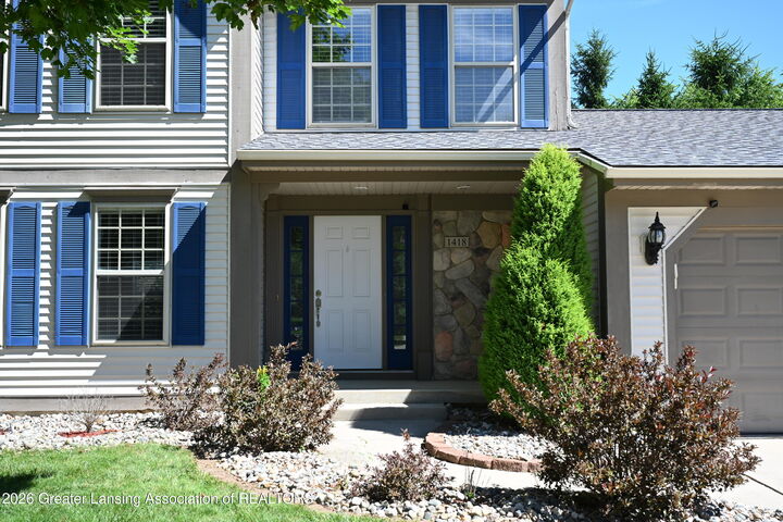 Property Photo:  1418 Ivywood Drive  MI 48864 