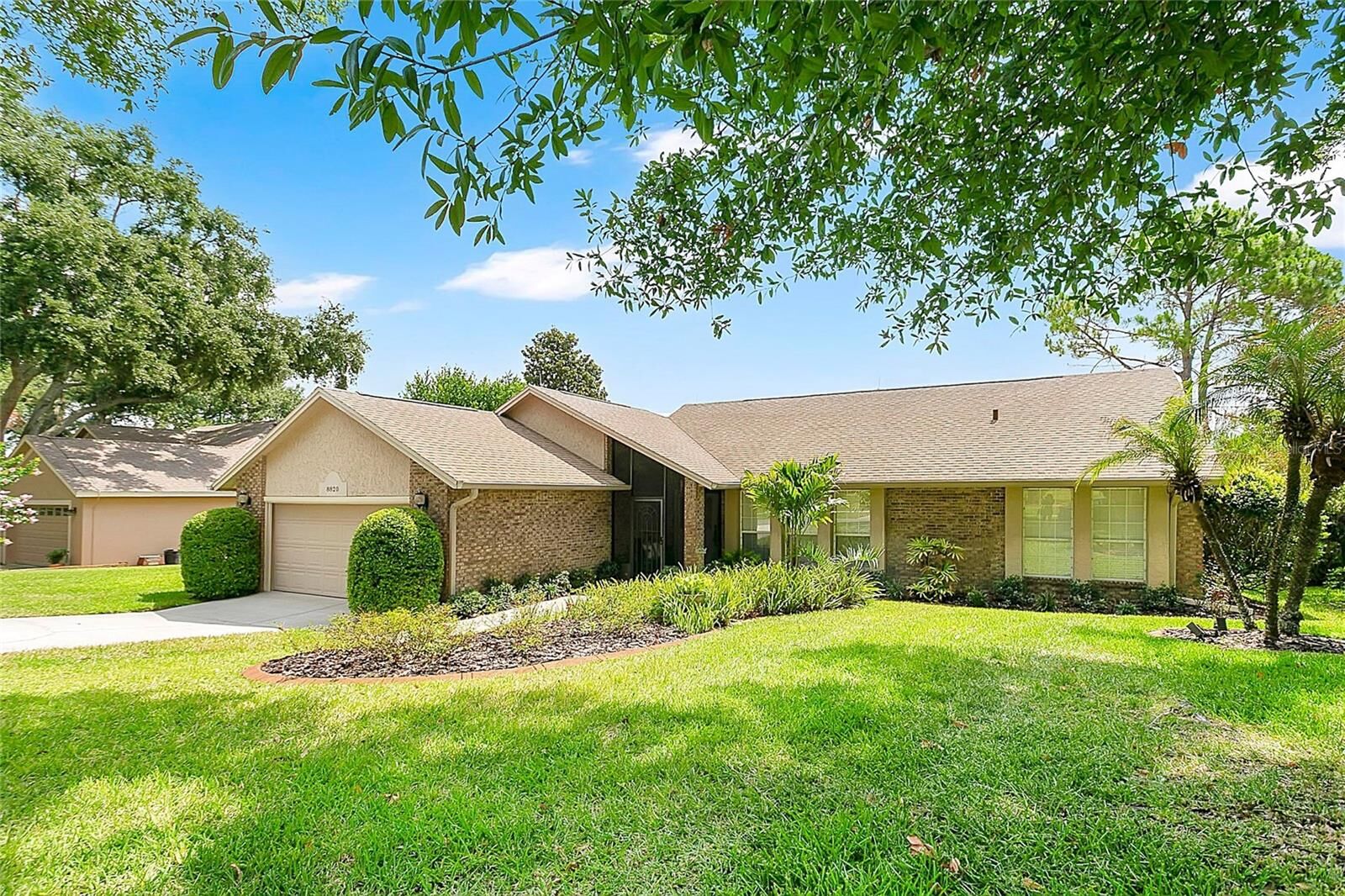 Property Photo: 8820 Spyglass Loop FL 34711