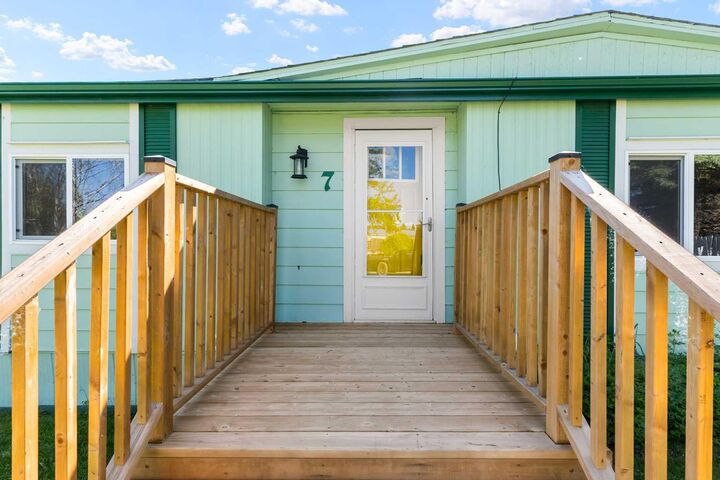 Property Photo: 7 Tamarack Crescent NW AB T0M 1X0