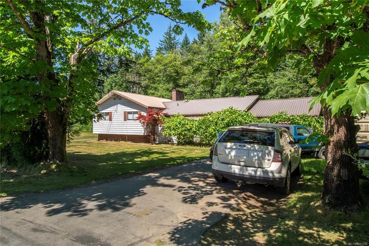Property Photo: 7602 Island Hwy N BC V9J 1G3