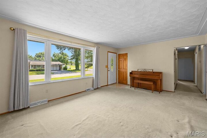 Property Photo:  3804 John Glenn Drive  IL 62040 