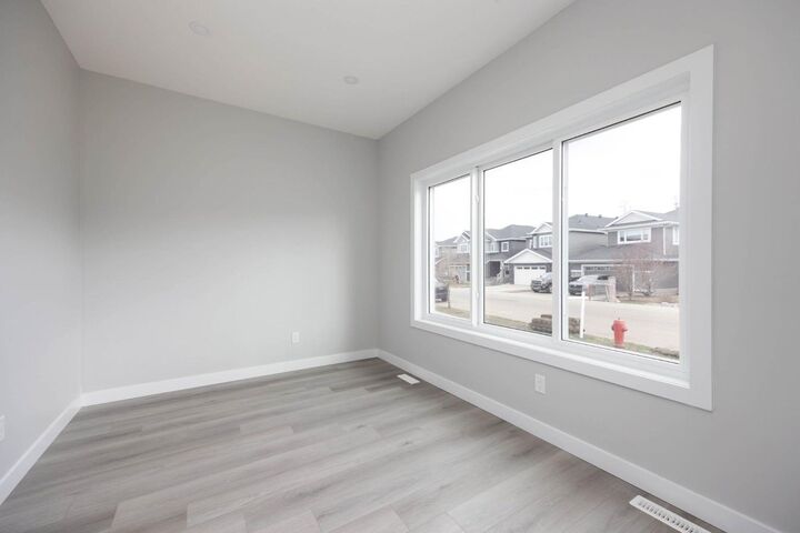Property Photo: 185 Dafoe Way AB T9K 2Y5