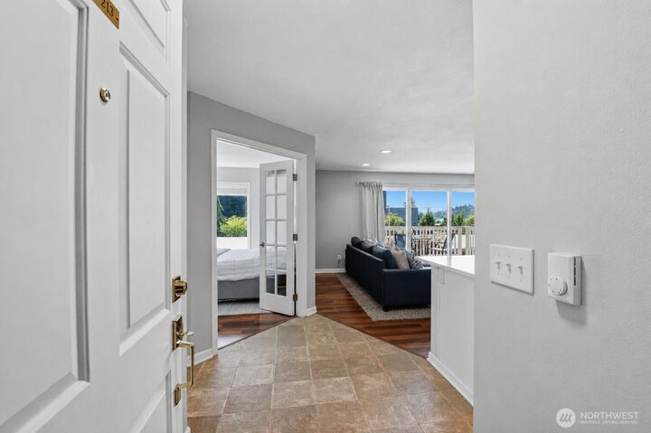 Property Photo:  5021  Ripley Lane N 213  WA 98056 