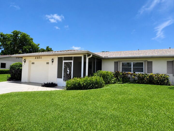 Property Photo:  6401 Lasalle Drive  FL 33484 