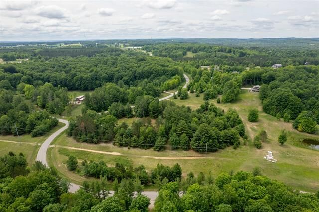 Property Photo:  5502 Paradise Ranch  MI 49649 