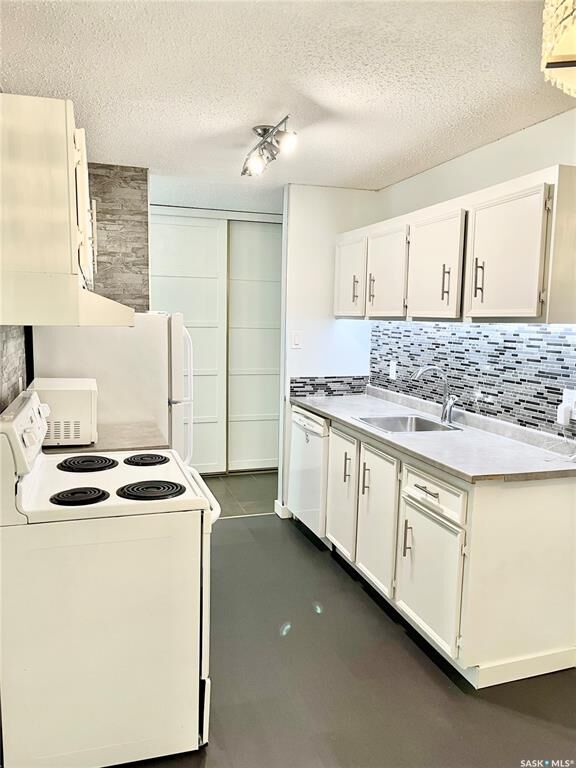 Property Photo:  207C Tait Place 150  SK S7H 5L8 