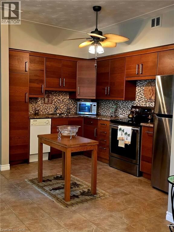 Property Photo: 10 Woodman Drive South 108 ON L8K 4E1