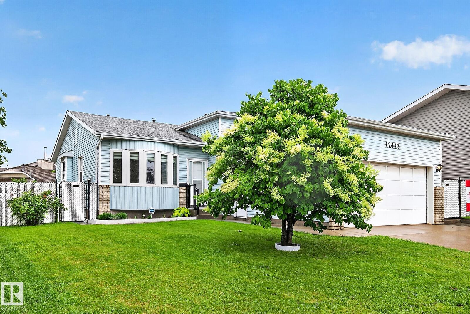 Property Photo:  12443 55 Street NW  AB T5W 5E7 