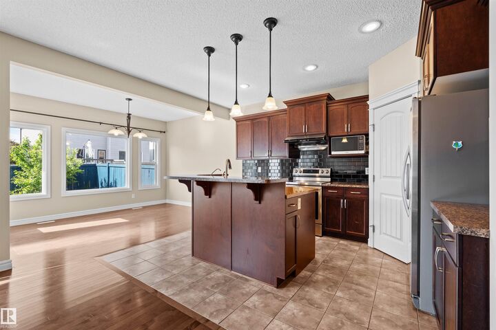 Property Photo: 11711 16 Ave SW SW AB T6W 1M9