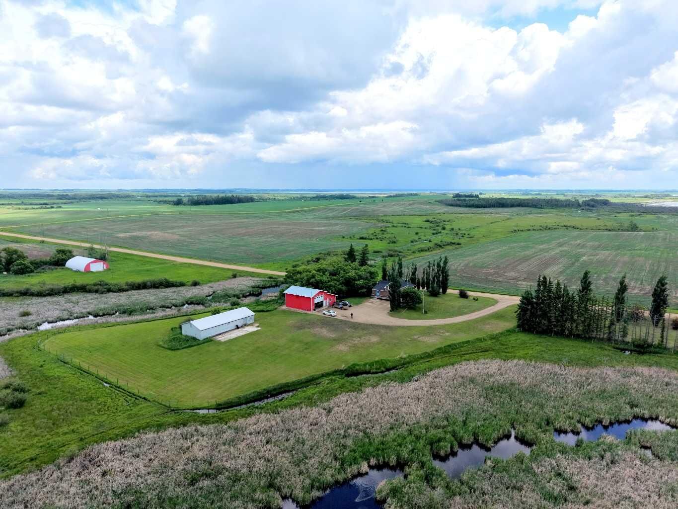 Property Photo:  Range Road 235 433062  AB T4J 1R1 