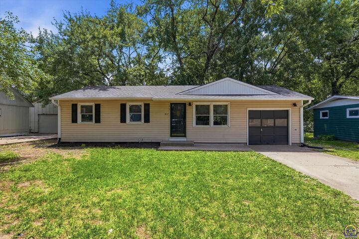 Property Photo:  3837 SE Humboldt St  KS 66609 
