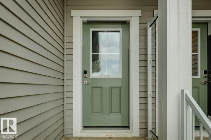 Property Photo: 2091 Egret Drive NW AB T6M 3G7