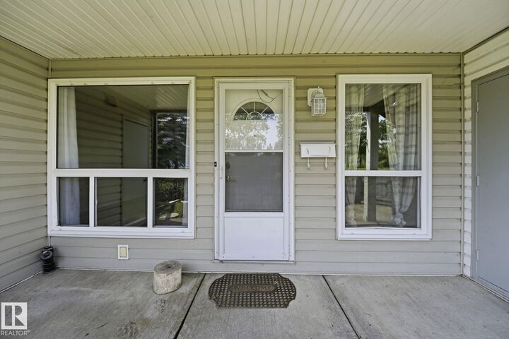 Property Photo:  2703 79 Street NW 123  AB T6K 3Z6 