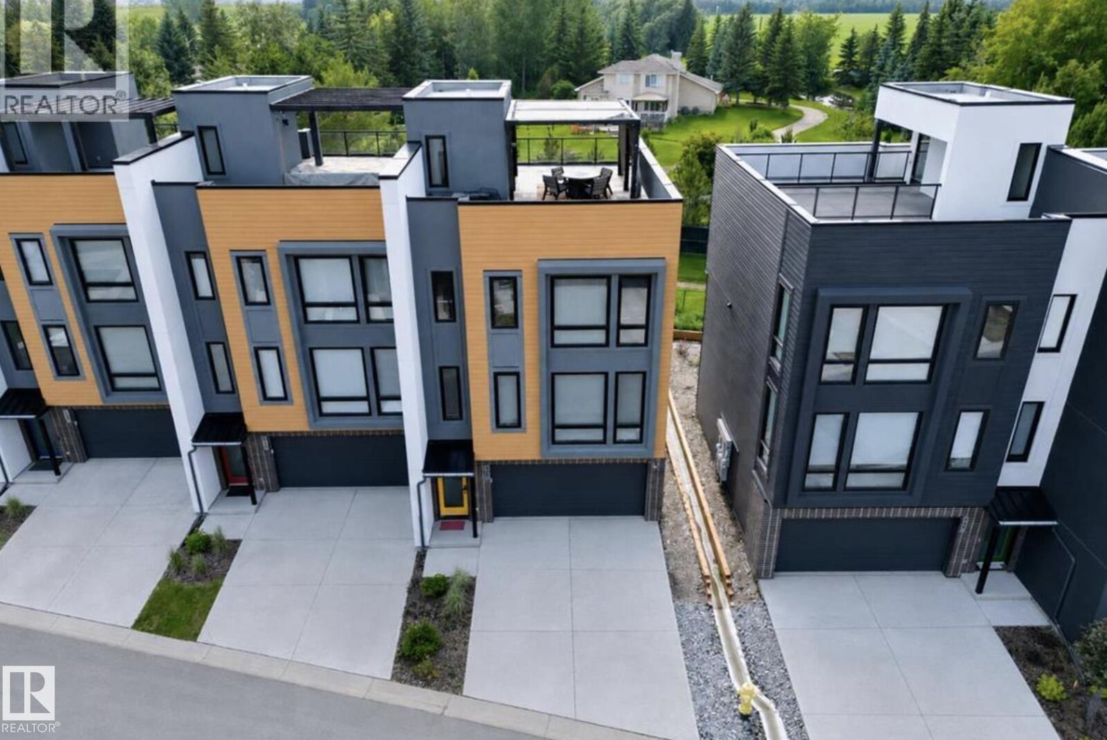 Property Photo: 1304 Rutherford Road SW 46 AB T6W 0B4