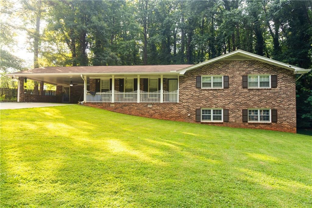 Property Photo: 5873 Button Gwinnett Place GA 30093