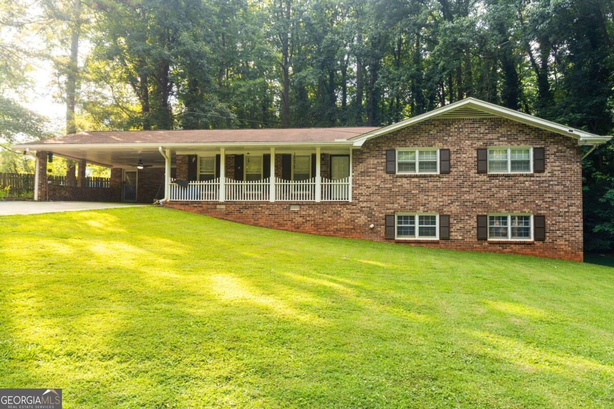 Property Photo: 5873 Button Gwinnett Place GA 30093