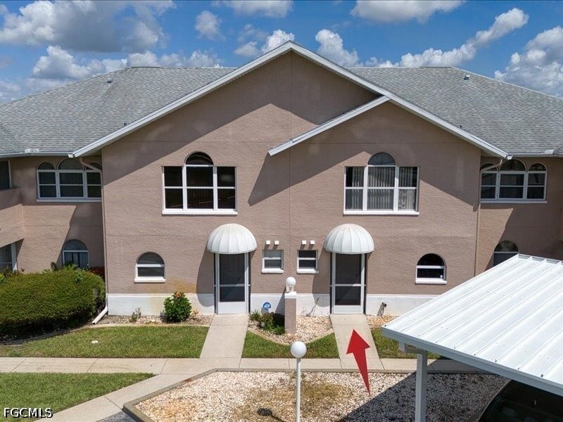 Property Photo: 28 Cosmopolitan Drive 15 FL 33936