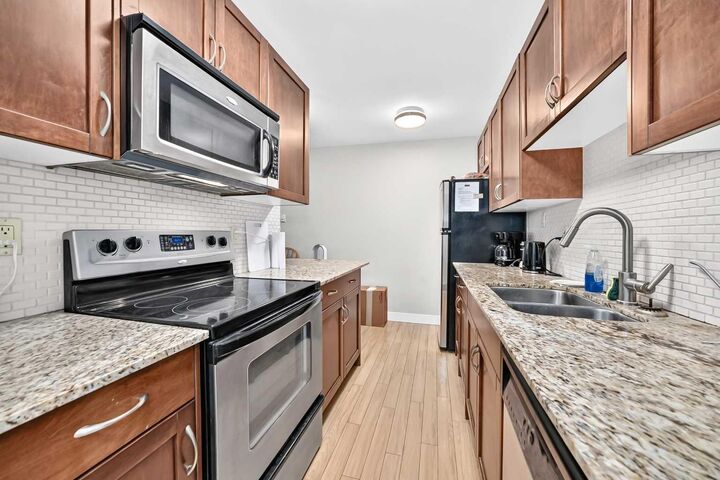Property Photo:  824 4 Avenue NW 102  AB T2N 0M8 