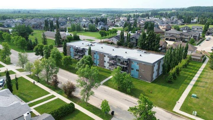 Property Photo: 709 6 Ave SE 102 AB T0G 2A3