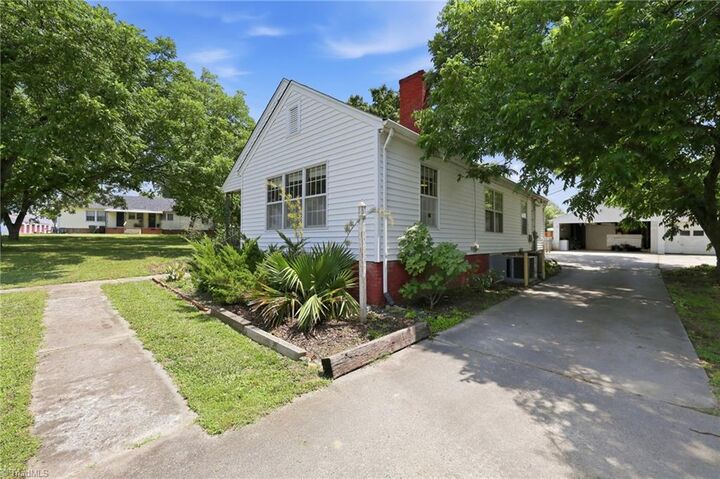 Property Photo:  214 Hawthorne Lane  NC 27215 