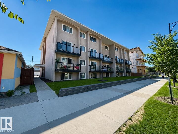 Property Photo:  11429 124 Street NW 205  AB T5M 0K4 