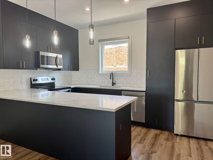 Property Photo: 10125 116 Avenue NW Upper AB T5G 2T5