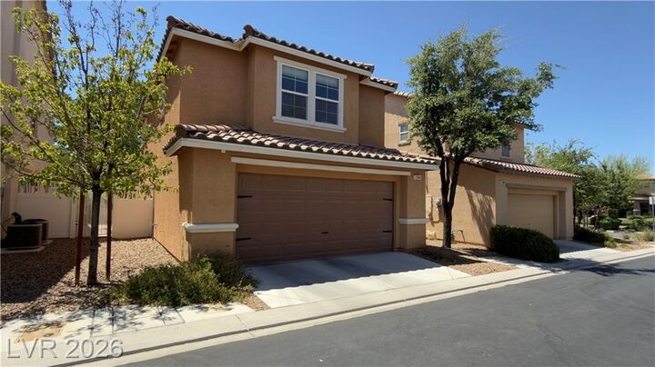 Property Photo:  2084 Airy Petals Walk  NV 89044 