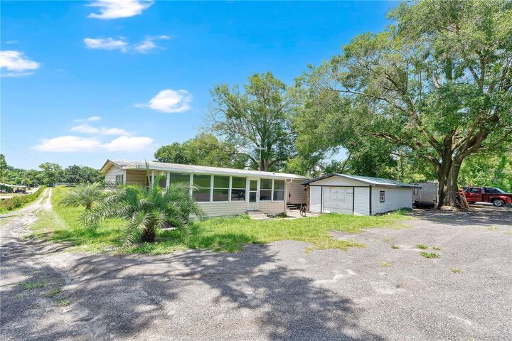 Property Photo:  4850 W Ponkan Road  FL 32712 