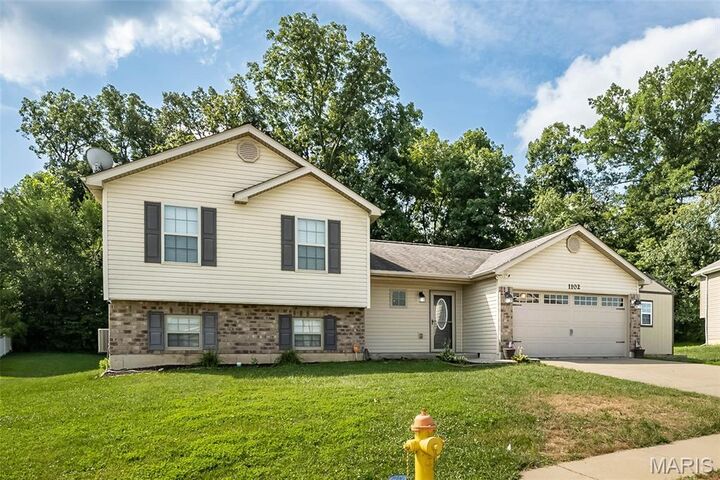 Property Photo:  1102 Marathon Drive  MO 63348 