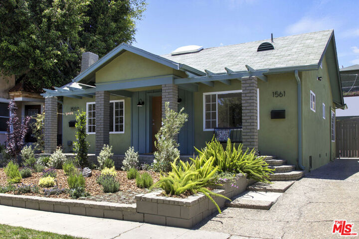 Property Photo:  1561 Carmona Avenue  CA 90019 