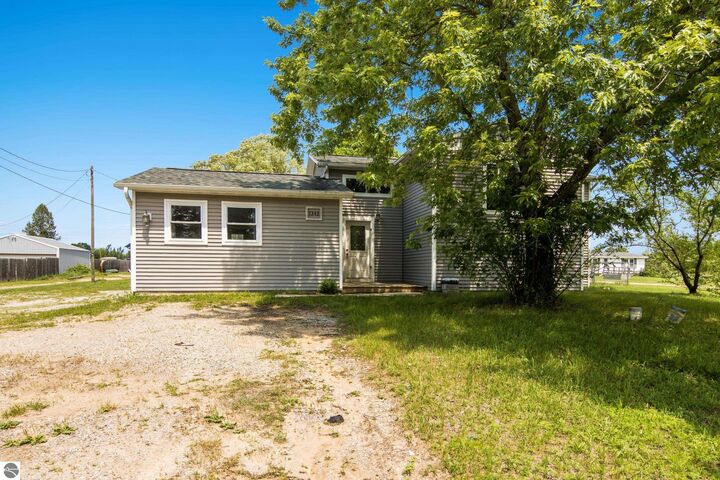 Property Photo:  1343 E Duck Lake Road  MI 49637 