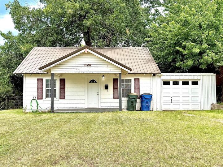 Property Photo: 1128 W Tennessee Avenue OK 73018