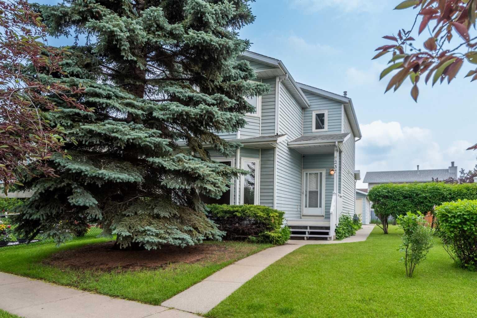 Property Photo: 232 Erin Woods Drive SE AB T2B 3B9
