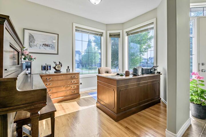 Property Photo: 14 Cimarron Park Cove AB T1S 2L8
