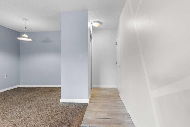 Property Photo: 10120 Brookpark Boulevard SW 123 AB T2W 3G3