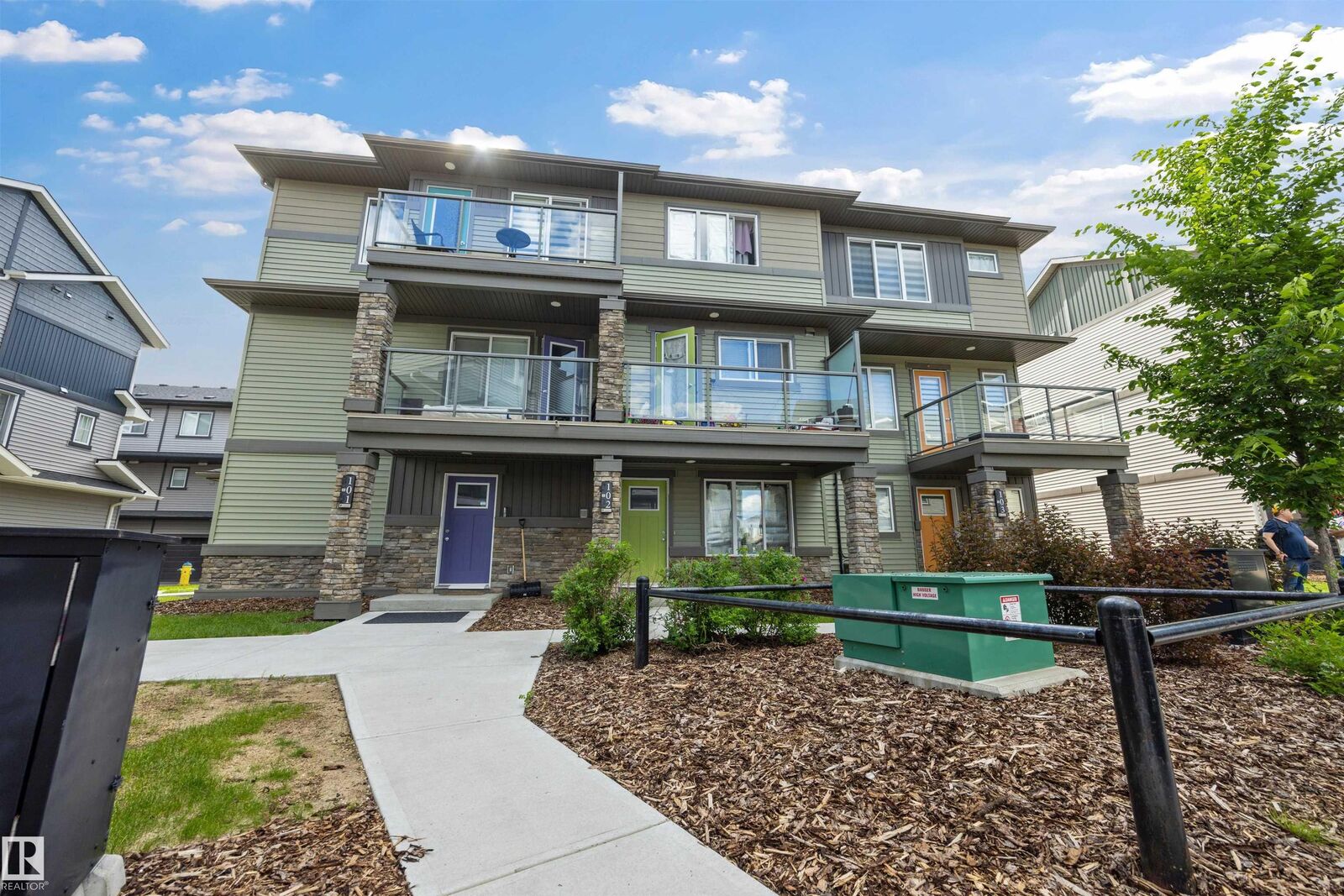 Property Photo: 1530 Tamarack Boulevard NW 102 AB T6T 2E6