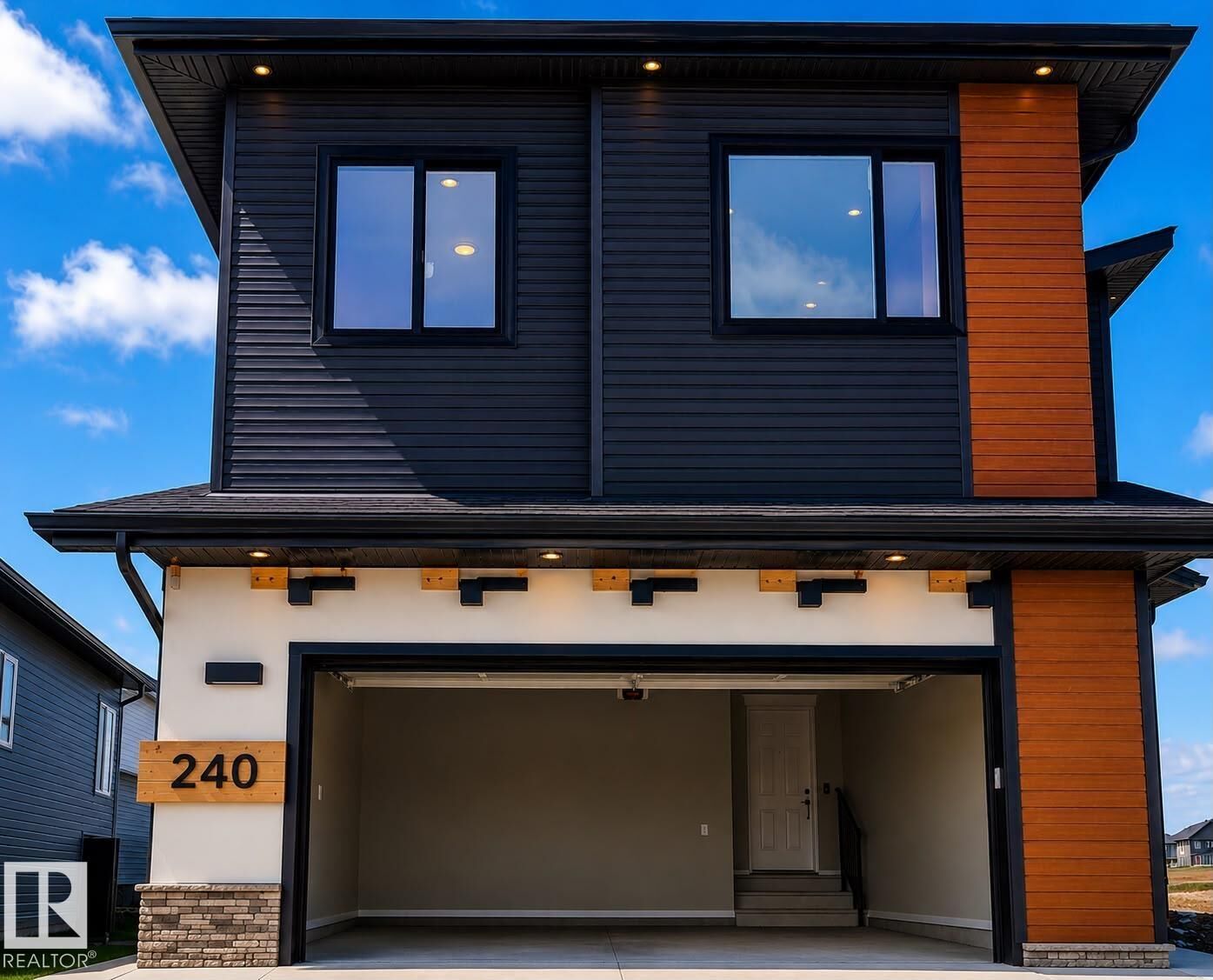 Property Photo: 240 166 Avenue NE AB T5Y 4J2