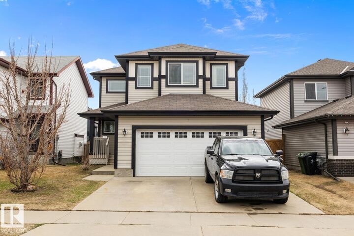 Property Photo:  178 Woodbend Way  AB T8L 4S4 
