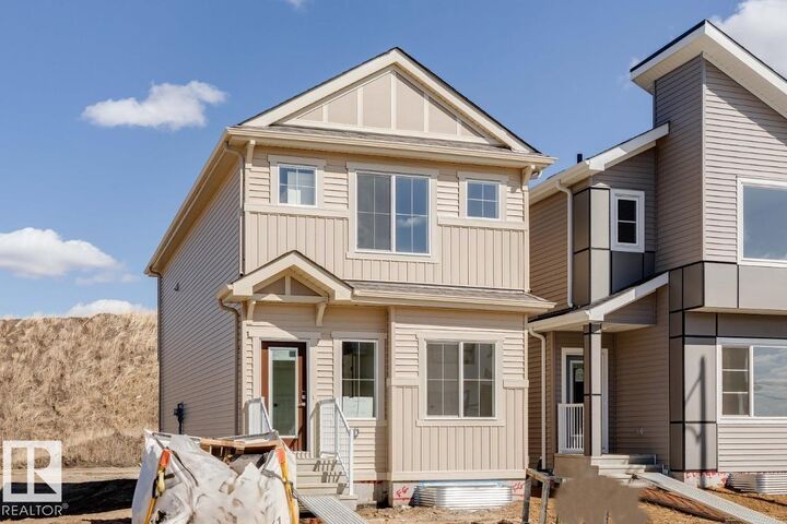 Property Photo: 319 Edgemont Drive NW AB T6M 3G7