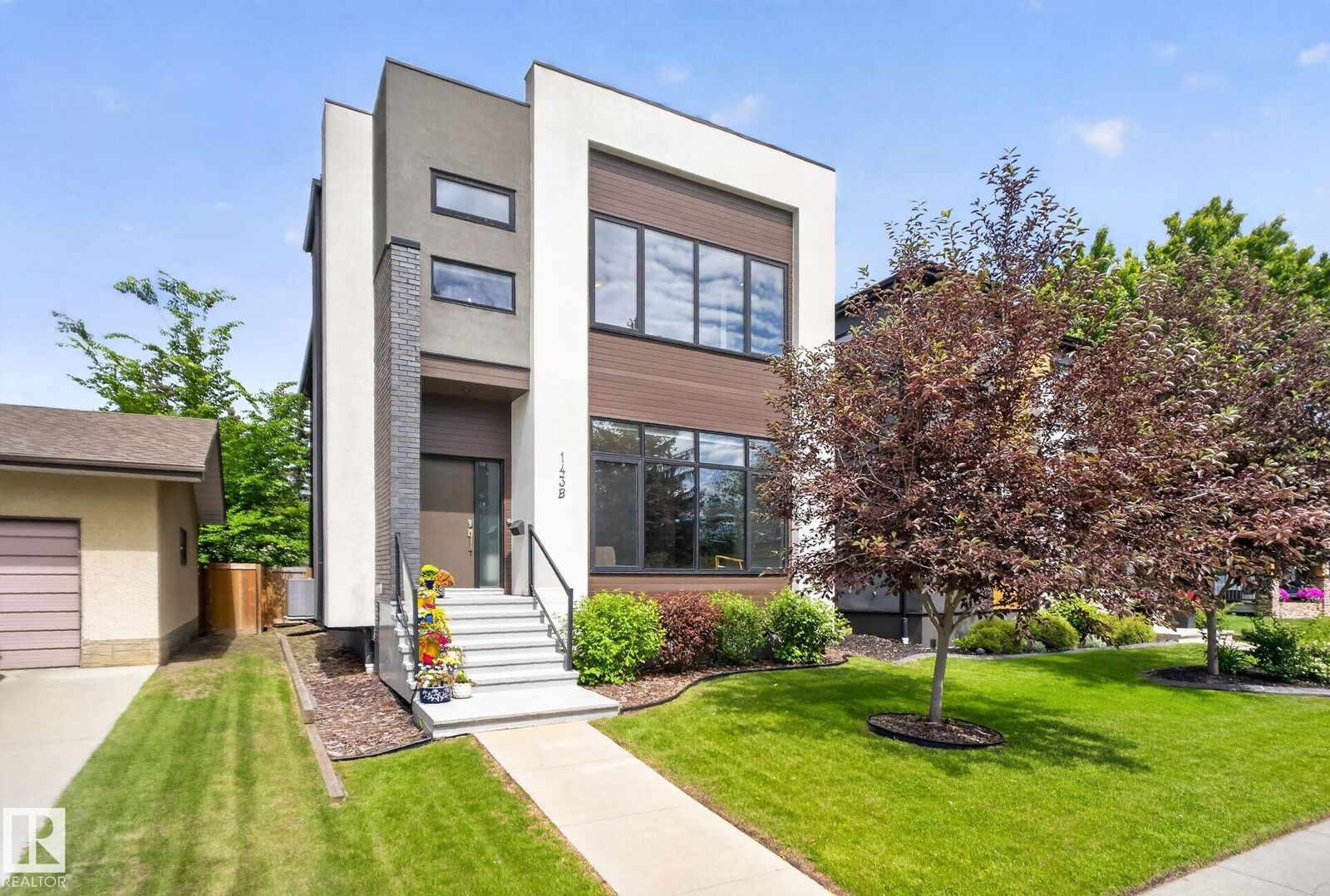 Property Photo:  143B Laurier Drive NW  AB T5R 5P9 