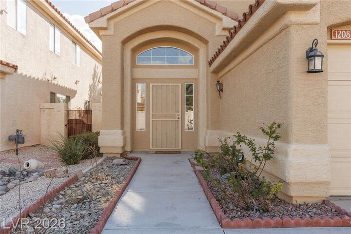 Property Photo: 1208 Barton Green Drive NV 89128
