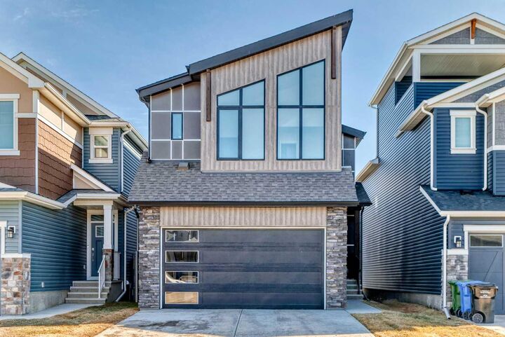 Property Photo: 138 Silver Spruce Grove SW AB T2X 5M2