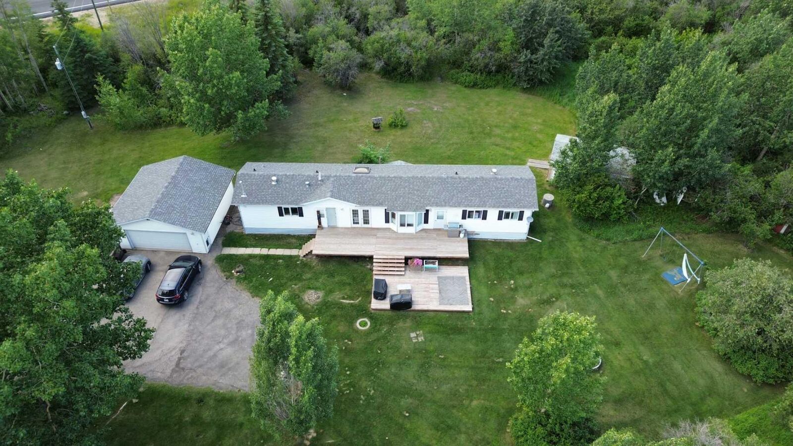 Property Photo:  712003 Range Road 64  AB T8W 5B8 